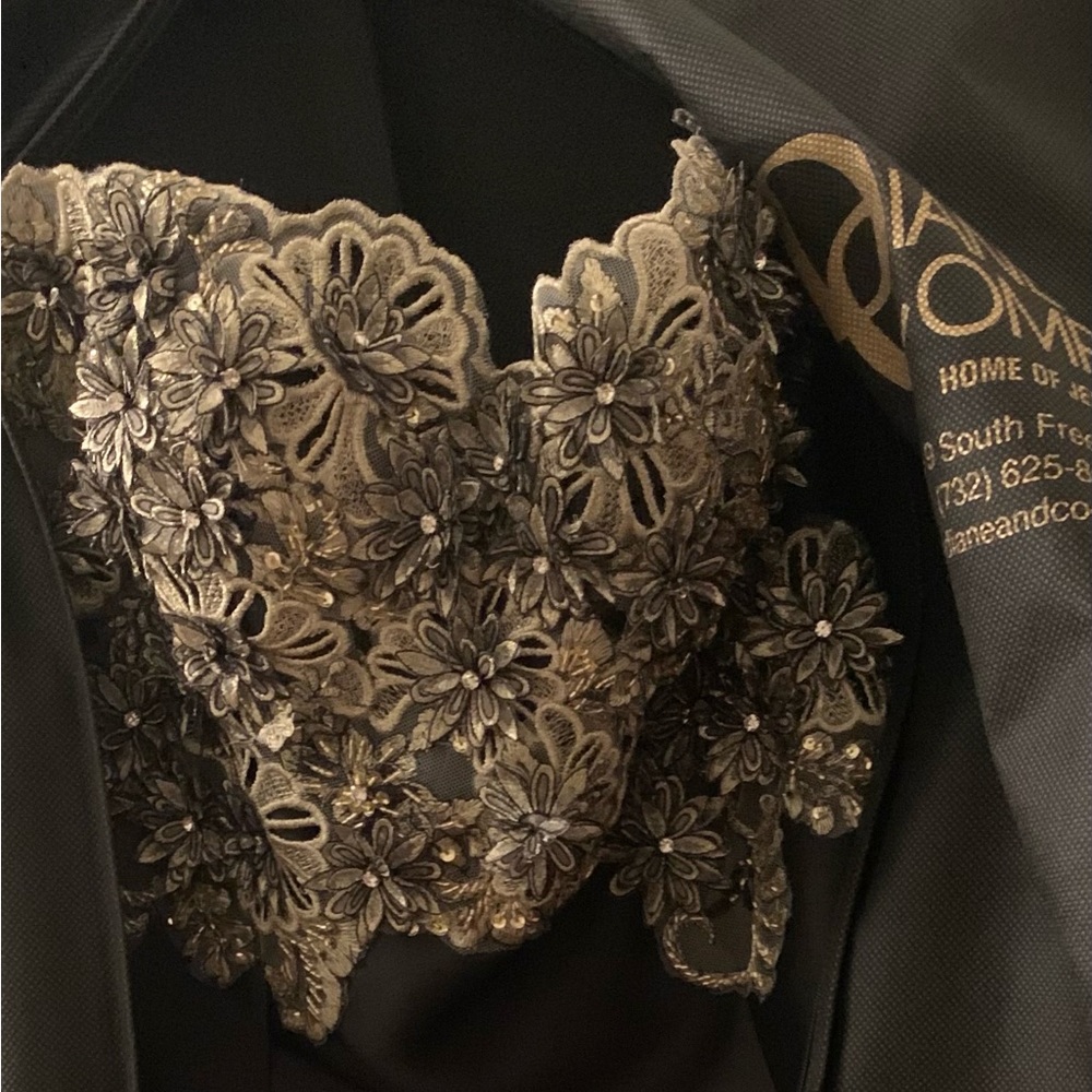 Custom made gown , trumpet bottom , beading embellishments